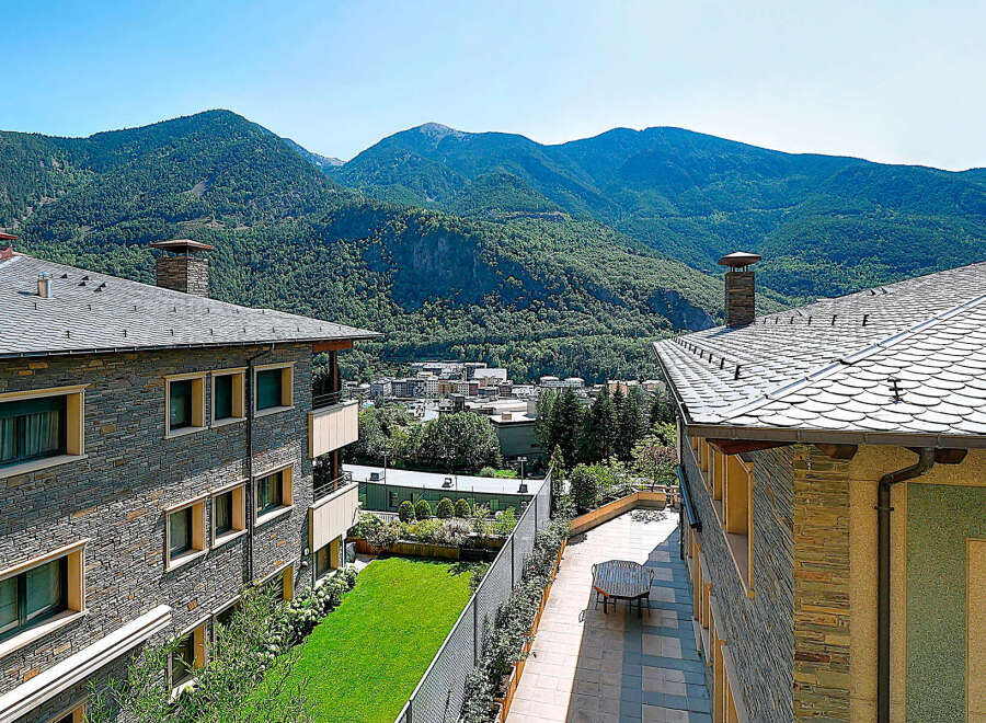 Experience breathtaking mountain views from this stunning property.