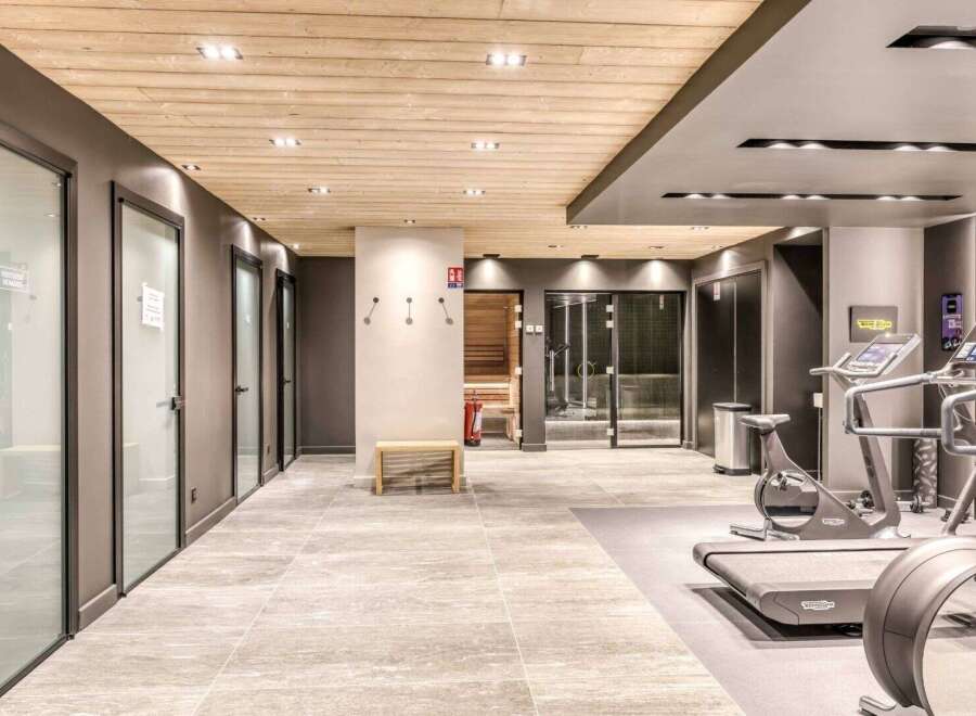 Step into luxury and wellness with this stunning property featuring a state-of-the-art fitness center.