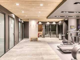 Step into luxury and wellness with this stunning property featuring a state-of-the-art fitness center.