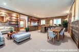 This stunning property boasts a seamless blend of rustic charm and modern elegance.