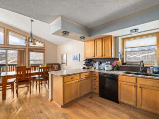 This stunning kitchen boasts a warm and inviting atmosphere, perfect for culinary creations and family gatherings.