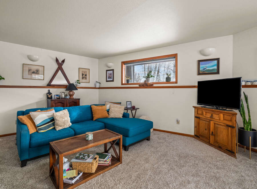 Discover the charm of this inviting living space, perfect for relaxation and entertainment.