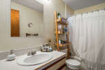 This bathroom features a clean and functional design, perfect for everyday use.
