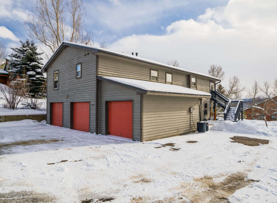 This stunning property boasts a spacious two-story design with a charming exterior.
