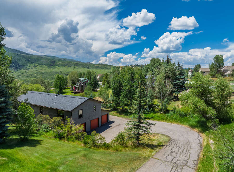 Nestled amidst lush greenery and rolling hills, this property offers a serene mountain retreat.