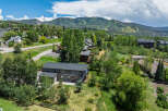 Nestled amidst lush greenery and offering stunning mountain views, this property boasts a spacious multi-level home perfect for family living.