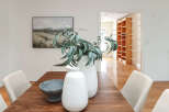 This stunning property boasts a beautifully designed dining area, perfect for hosting gatherings.