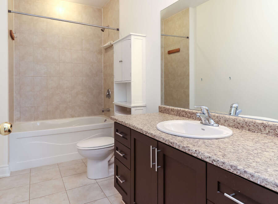 This bathroom features a clean and modern design with a neutral color palette.