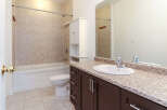 This bathroom features a clean and modern design with a neutral color palette.