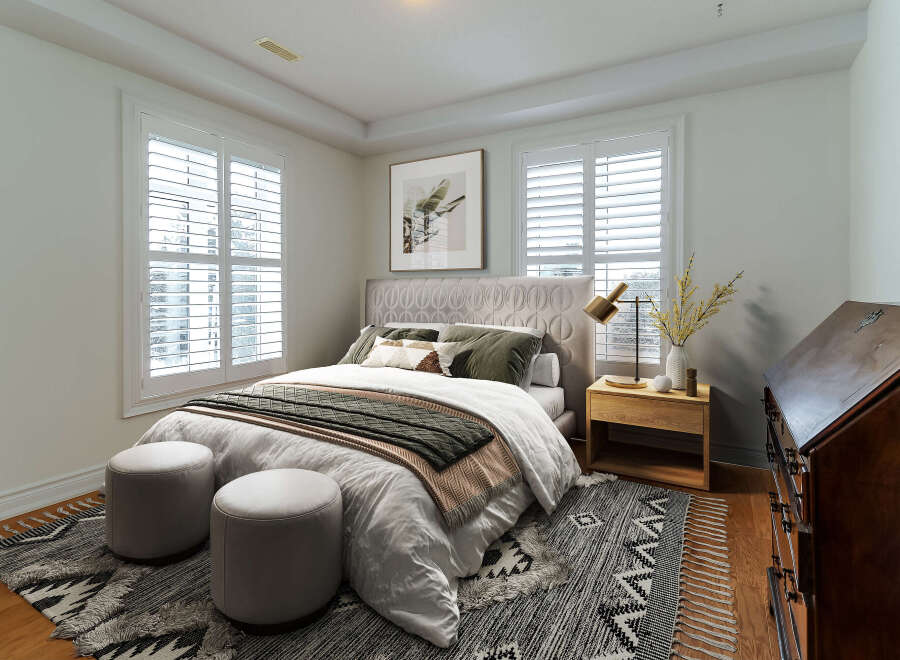 This stunning bedroom offers a serene retreat with its elegant design and inviting ambiance.