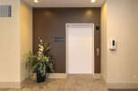 This image showcases a well-maintained elevator lobby, perfect for a modern property.
