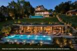 Experience luxury living with this stunning property featuring two exquisite swimming pools, one an infinity pool overlooking the landscape and another on the lower level.