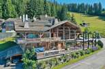 Discover the charm of this stunning wooden chalet, a perfect blend of rustic elegance and modern comfort.