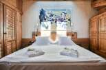 Experience luxury and comfort in this beautifully designed bedroom.
