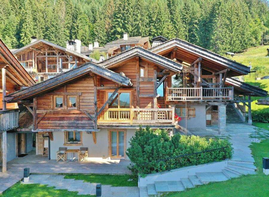 Discover the charm of this stunning wooden chalet nestled in a serene, natural setting.