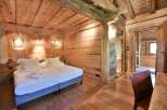 Experience rustic charm in this beautifully designed bedroom.