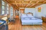 Experience rustic elegance in this stunning bedroom.