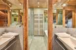 Experience luxury in this stunning bathroom featuring a modern design and high-end finishes.