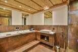 Experience luxury in this stunning bathroom featuring a sleek, modern design.