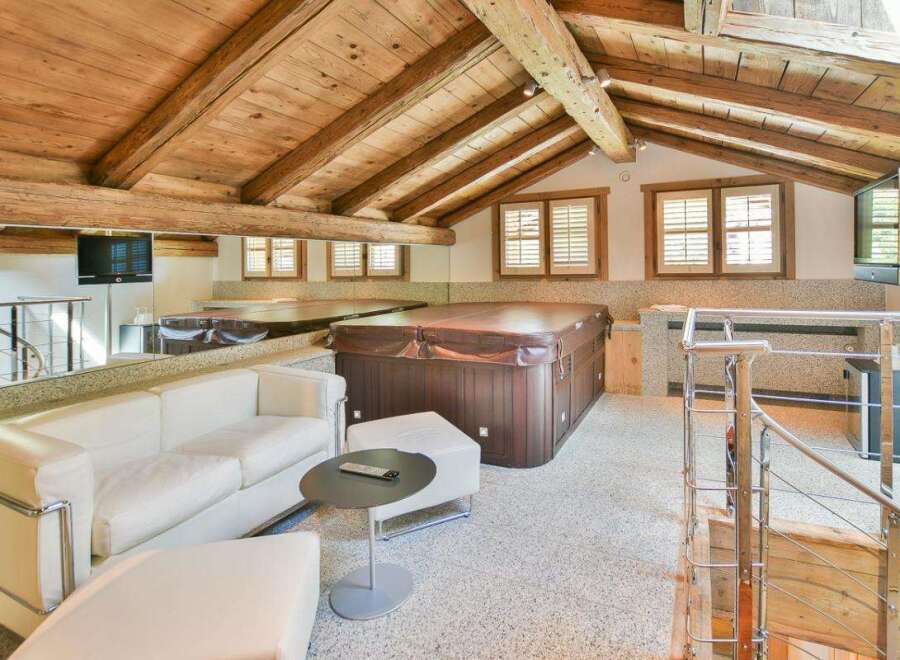 Experience luxury living in this stunning property featuring a spacious living area with a modern design.