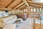 Experience luxury living in this stunning property featuring a spacious living area with a modern design.