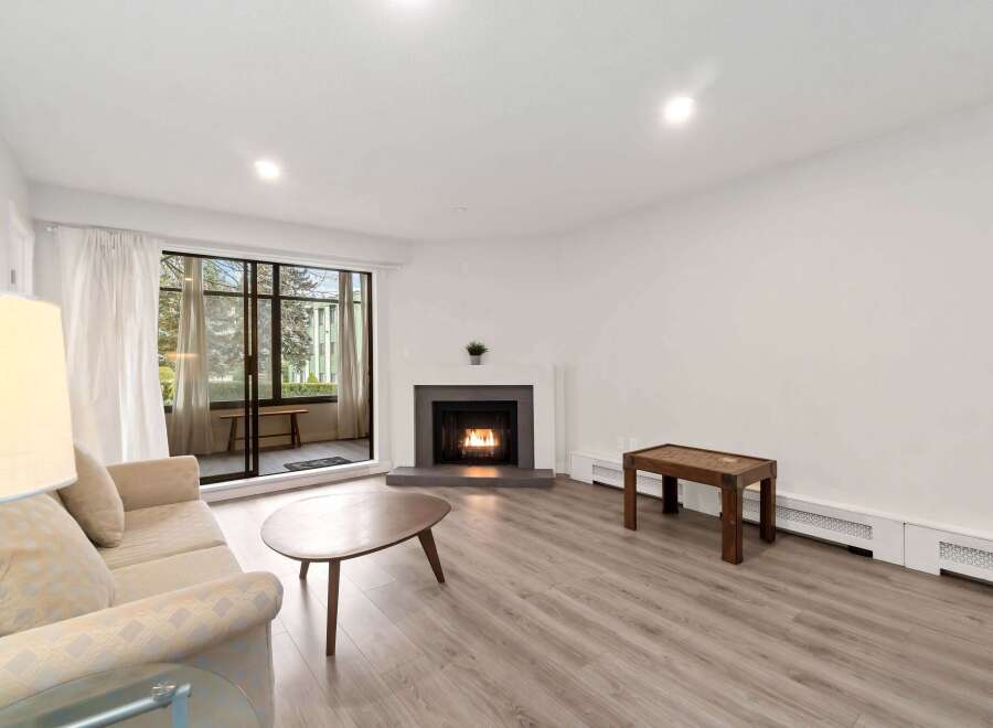This stunning property boasts a cozy living room with a fireplace, perfect for those chilly evenings.