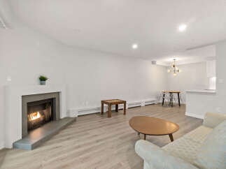 This stunning property boasts a cozy fireplace, perfect for those chilly evenings.