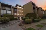 Discover a charming condo building with a unique architectural design.