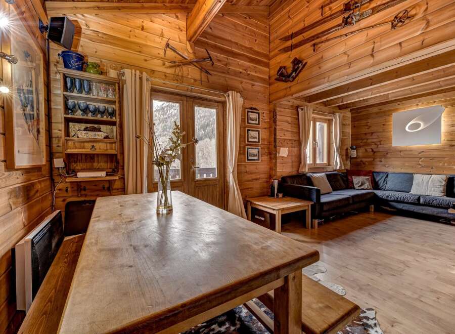 Step into a cozy mountain retreat with this stunning cabin.