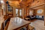 Step into a cozy mountain retreat with this stunning cabin.