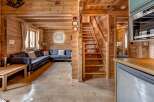Step into this stunning wooden cabin, a perfect blend of rustic charm and modern comfort.
