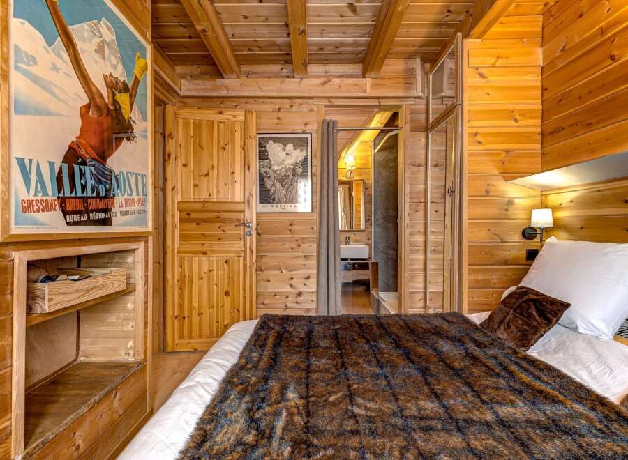 Experience the charm of this cozy wooden cabin, perfect for a relaxing getaway.