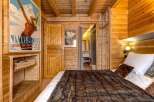 Experience the charm of this cozy wooden cabin, perfect for a relaxing getaway.
