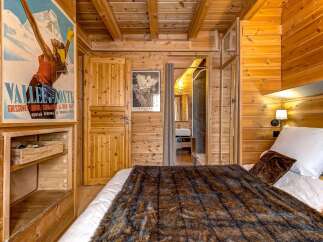 Experience the charm of this cozy wooden cabin, perfect for a relaxing getaway.