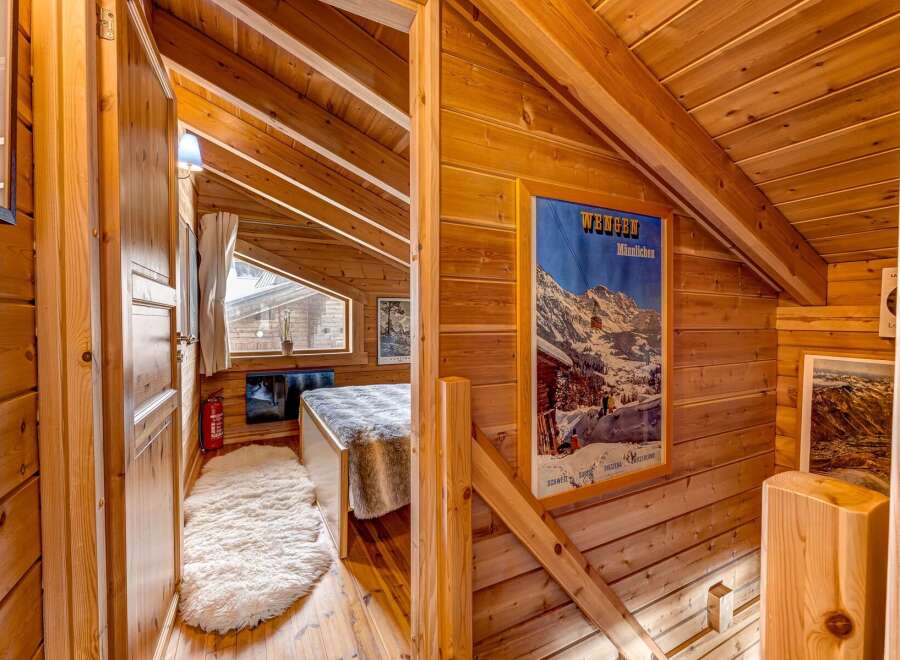 Step into a cozy and inviting space with this charming wooden interior.