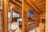 Step into a cozy and inviting space with this charming wooden interior.