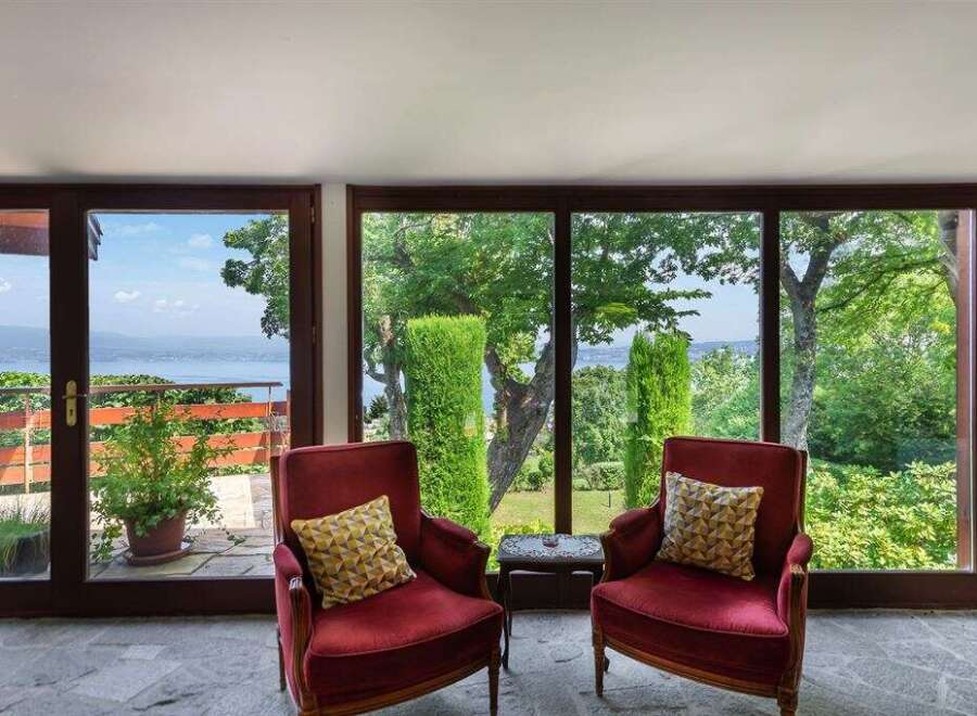 Enjoy breathtaking views from this stunning property! This home features large windows that offer panoramic views of the surrounding landscape.