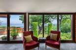 Enjoy breathtaking views from this stunning property! This home features large windows that offer panoramic views of the surrounding landscape.