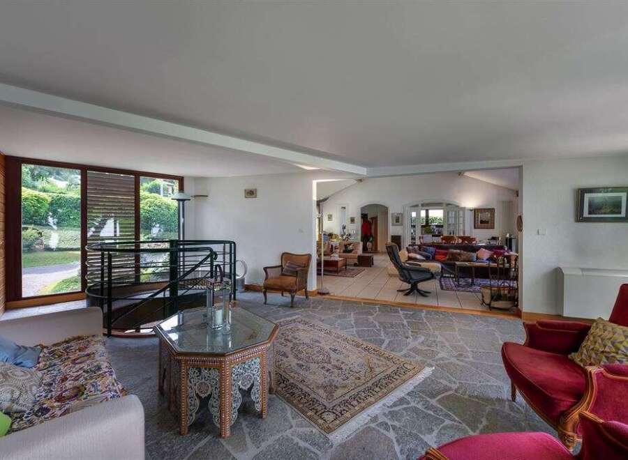 Step into luxury with this stunning property, showcasing an open-concept living space perfect for entertaining.