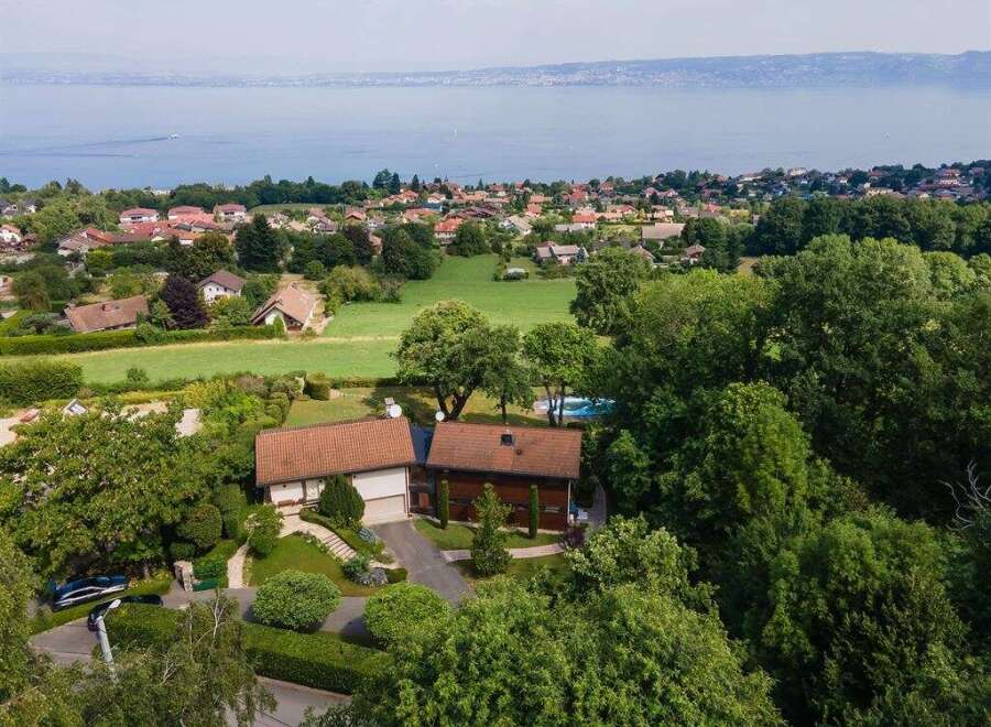 Nestled amidst lush greenery, this stunning property offers breathtaking views of the surrounding landscape.