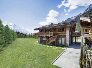 Experience the epitome of alpine luxury in this stunning wooden chalet.