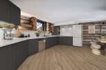 Step into this stunning kitchen, a perfect blend of rustic charm and modern design.