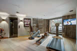 This luxurious home gym offers a perfect blend of fitness and relaxation.