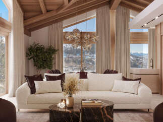 Experience luxury living in this stunning property, featuring a spacious living area with a cozy sofa and elegant marble coffee tables.