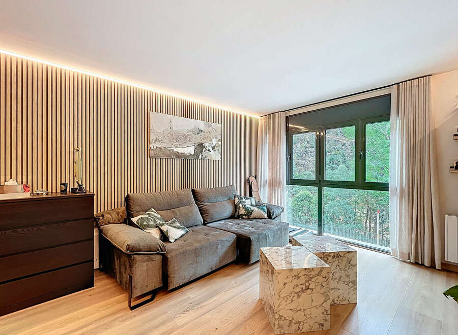 Experience modern living in this stylish property, featuring a beautifully designed living room.