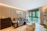 Experience modern living in this stylish property, featuring a beautifully designed living room.