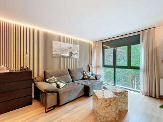 Experience modern living in this stylish property, featuring a beautifully designed living room.