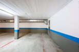 Discover the potential of this spacious parking garage, perfect for secure vehicle storage.