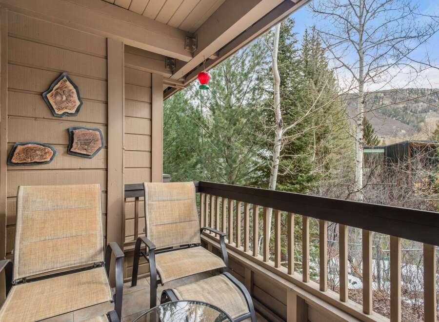 Enjoy breathtaking views from this charming balcony.