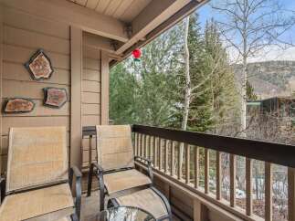 Enjoy breathtaking views from this charming balcony.